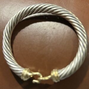 David Yurman Silver and Gold Cable Bracelet 7M retails for $1,900.